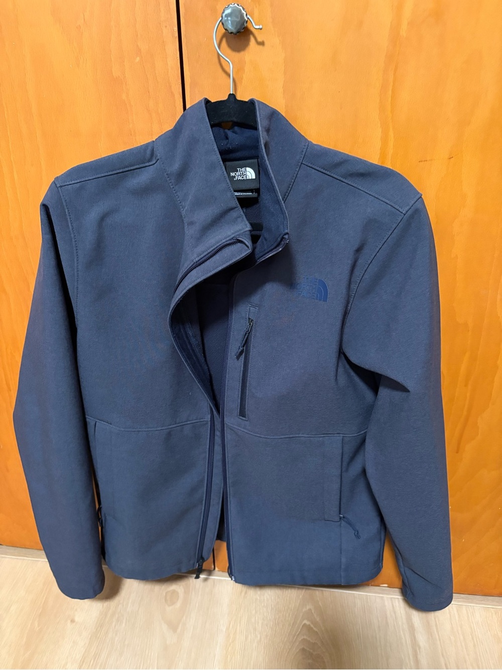 The North Face Men's Navy Softshell Jacket with Zip Pockets